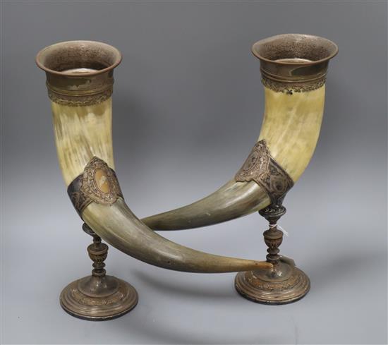 A pair of plated mounted horn vases height 35cm